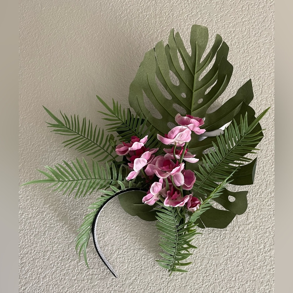 Tropical fascinator for costume or event. Orchids with greenery. Worn once